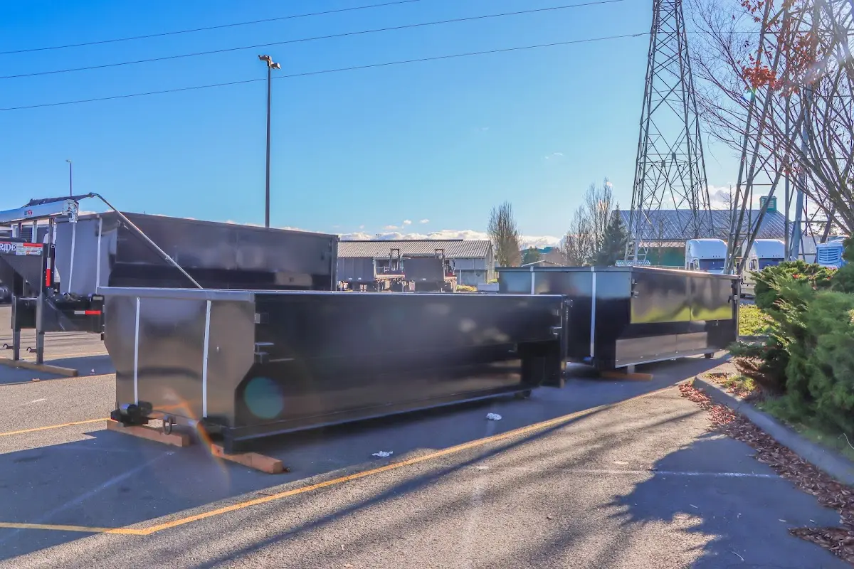Roll-off dumpster ready for waste disposal at job site for 15 Yard Dumpster Rental in Cooper